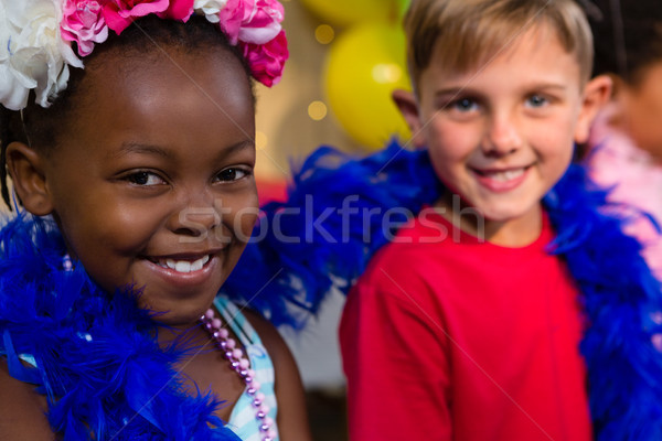 Portrait enfants plumes fête d'anniversaire fête amour [[stock_photo]] © wavebreak_media