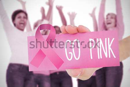 Magasról fotózva kilátás nő rózsaszín szalag áll szürke Stock fotó © wavebreak_media