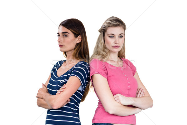 Foto stock: Alterar · amigos · los · brazos · cruzados · pie · blanco · femenino