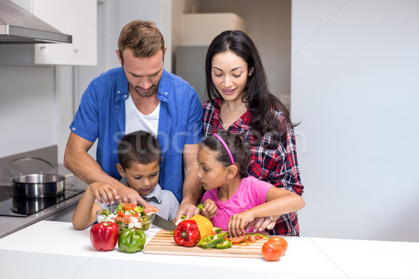 Boldog család konyha tapsolás zöldségek otthon boldog Stock fotó © wavebreak_media