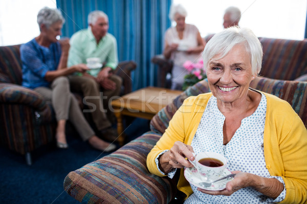 Portret senior vrouw drinken koffie pensioen Stockfoto © wavebreak_media