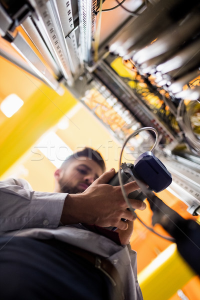 Technician using digital cable analyzer Stock photo © wavebreak_media