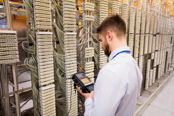 Technician using digital cable analyzer Stock photo © wavebreak_media