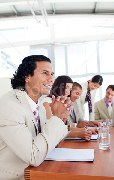 Portrait of a businessman and his team during a presentation Stock photo © wavebreak_media