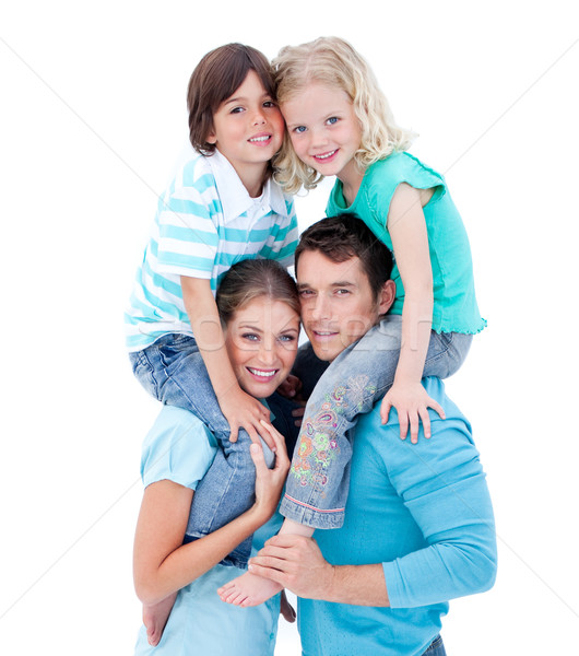 Loving parents giving their children piggyback ride Stock photo © wavebreak_media