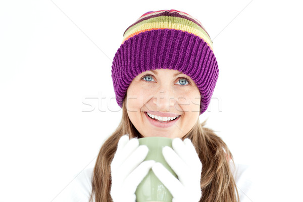 Bright woman holding a cup a coffee  Stock photo © wavebreak_media