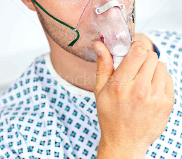 Close-up of a patient with a mask having flu  Stock photo © wavebreak_media