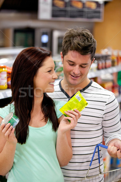 Lumineuses couple achat produits supermarché alimentaire [[stock_photo]] © wavebreak_media