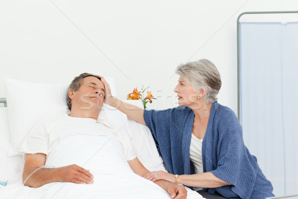 Mature woman taking care of her husband  Stock photo © wavebreak_media