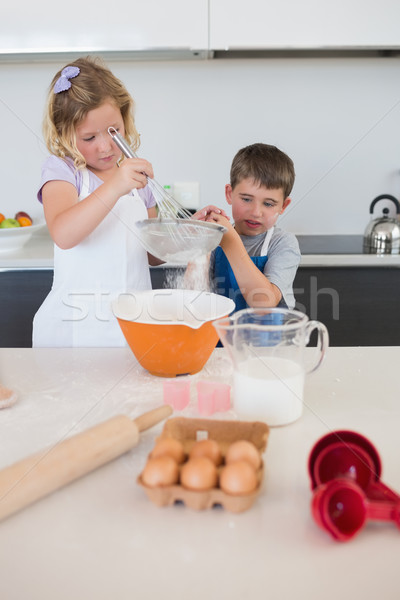 Stock photo: Children baking cookies in kitchen