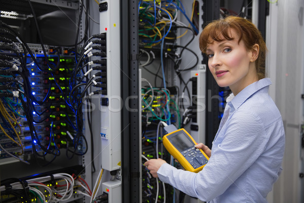 Technician using digital cable analyzer on server  Stock photo © wavebreak_media