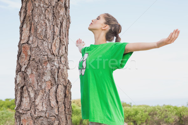 Female environmental activist in front of tree trunk Stock photo © wavebreak_media