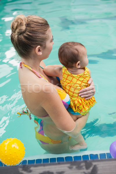 Pretty mother and baby at the swimming pool Stock photo © wavebreak_media