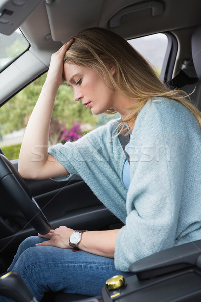 Worried woman sitting in drivers seat  Stock photo © wavebreak_media