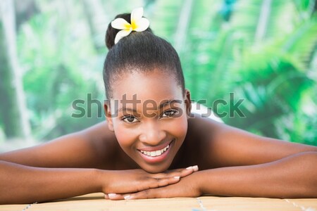 Beautiful woman on massage table at health farm Stock photo © wavebreak_media