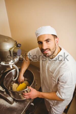 Baker using large mixer to mix dough Stock photo © wavebreak_media