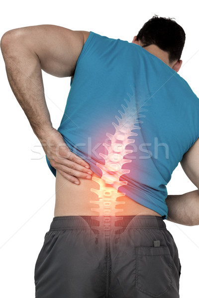 Highlighted back pain of fit man Stock photo © wavebreak_media