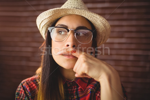 Schönen Hipster Schnurrbart Finger rot Ziegel Stock foto © wavebreak_media