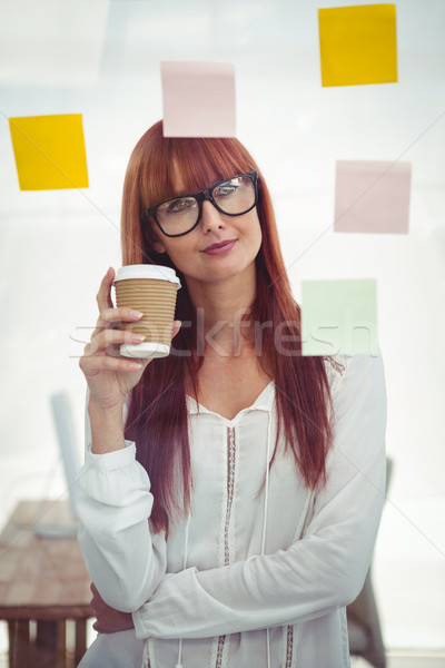 Attractive hipster woman with coffee cup Stock photo © wavebreak_media