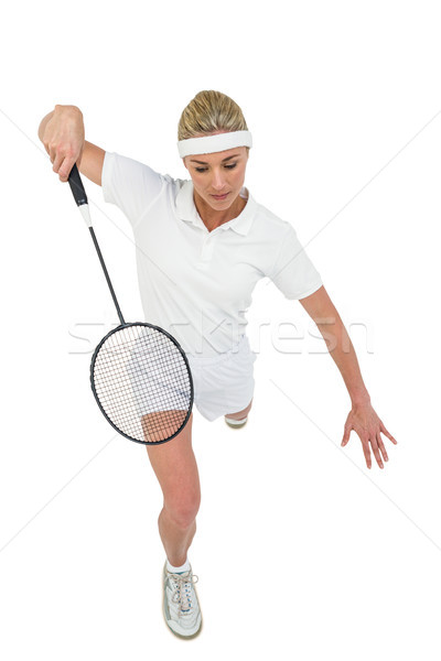 Stock photo: Badminton player playing badminton 