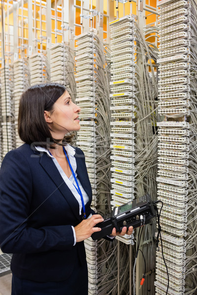 Technician using digital cable analyzer Stock photo © wavebreak_media