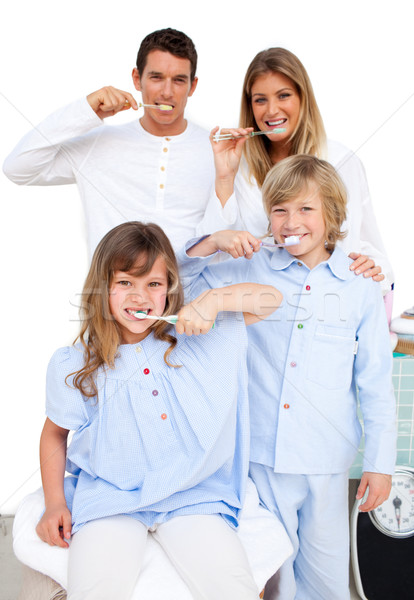 Jolly family brushing their teeth Stock photo © wavebreak_media