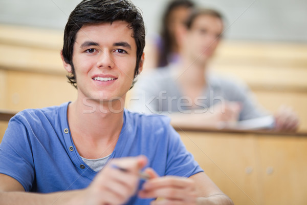 Student ascultare uita aparat foto fericit Imagine de stoc © wavebreak_media