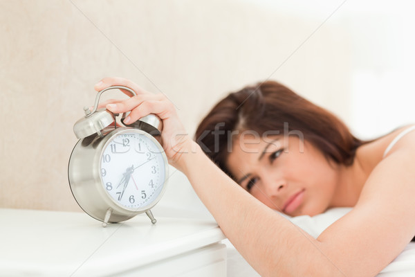 будильник время проснуться женщину кровать Сток-фото © wavebreak_media