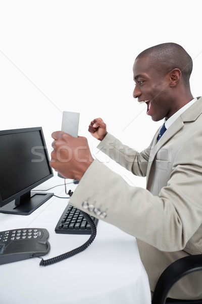 Portrait of a cheerful businessman using a computer against a white background Stock photo © wavebreak_media