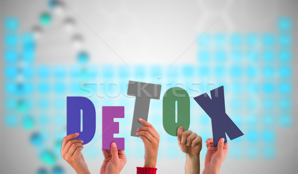 Composite image of hands holding up detox Stock photo © wavebreak_media