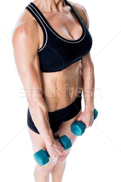 [[stock_photo]]: Homme · bodybuilder · deux · haltères · bras