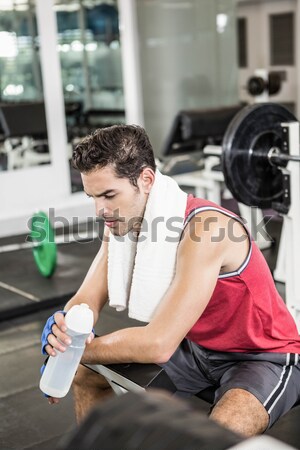 Personal trainer working with client on exercise ball Stock photo © wavebreak_media