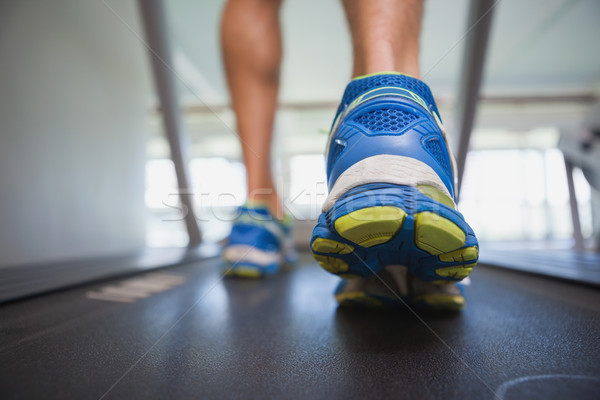 Low section of a man running on treadmill Stock photo © wavebreak_media