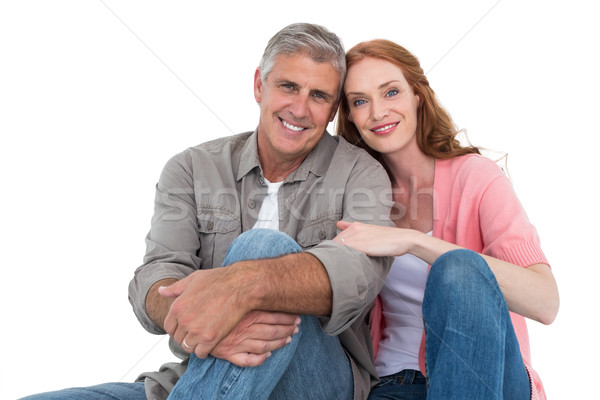Casual couple sitting and smiling Stock photo © wavebreak_media