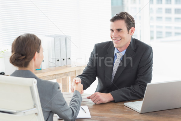 üzletember kézfogás üzletasszony iroda nő papír Stock fotó © wavebreak_media