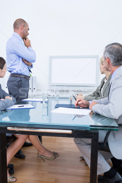 Business team looking at white screen Stock photo © wavebreak_media