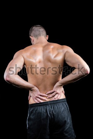 Starken Bodybuilder schmerzhaft zurück schwarz sexy Stock foto © wavebreak_media