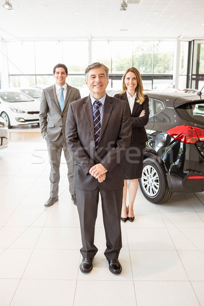 Group of smiling business team standing together Stock photo © wavebreak_media