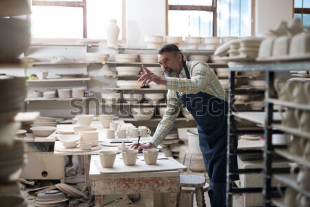 Mannelijke vrouwelijke keramische platen aardewerk Stockfoto © wavebreak_media
