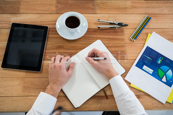 Geschäftsmann arbeiten Schreibtisch Büro Mann Stift Stock foto © wavebreak_media