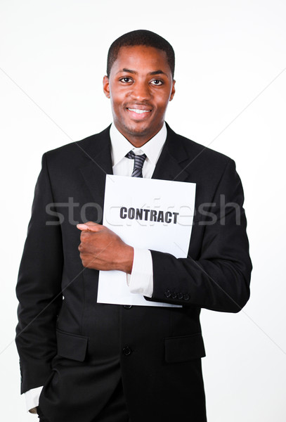 Happy businessman holding a contract  Stock photo © wavebreak_media