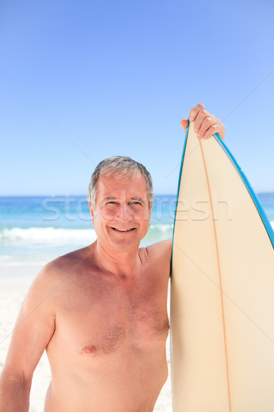 Olgun adam sörf plaj gülümseme spor yaz Stok fotoğraf © wavebreak_media