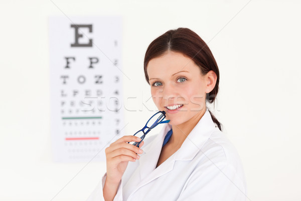 Női optikus látásvizsgálat mosoly szemek munka Stock fotó © wavebreak_media