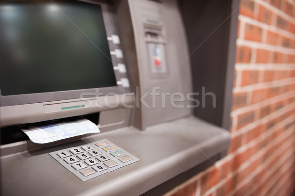 Közelkép bankautomata húsz eurók jegyzetek pénz Stock fotó © wavebreak_media