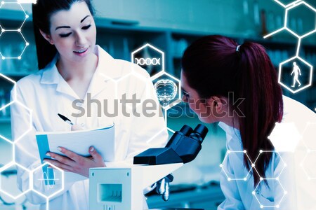 Male scientist looking at an Erlenmeyer flask in a laboratory Stock photo © wavebreak_media