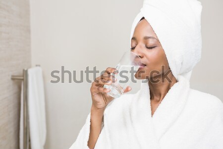 Stock photo: Attractive man having breakfast in his kitchen