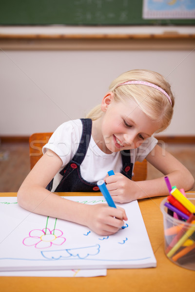 Portrait of a girl drawing in a classroom Stock photo © wavebreak_media