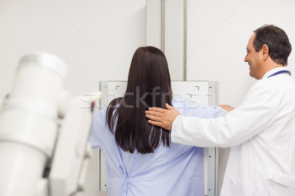 Doctor proceeding a mammography on a patient in an examination room Stock photo © wavebreak_media