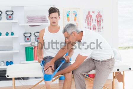 Nurse giving biscuits to a patient in hospital ward Stock photo © wavebreak_media