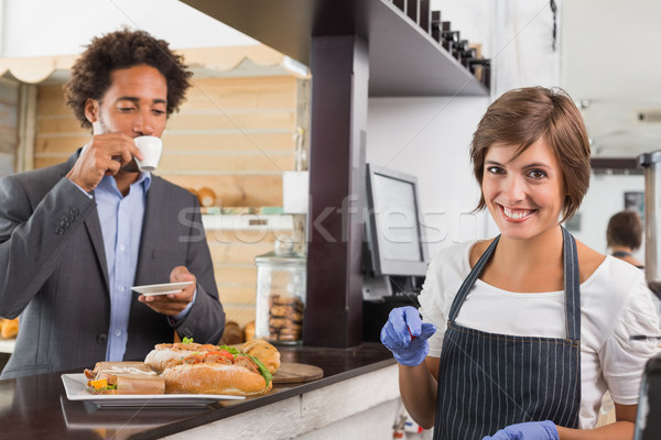 Felice server counter coffee shop business Foto d'archivio © wavebreak_media